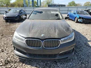 2019 BMW 7 Series with VIN WBA7F2C13KB242430, listed as a Copart auction lot 55525835 with 58,559 mi miles and Salvage title. Bid and sale history available at DreamBid. Image 5.