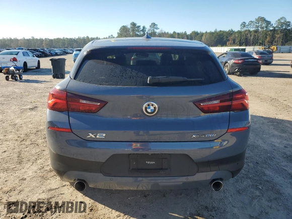 2022 BMW X2 xDrive28i with VIN WBXYJ1C0XN5T67566, listed as a Copart auction lot 86689864 with 42,496 mi miles and Salvage Title. Bid and sale history available at carsss.com. Image 6.