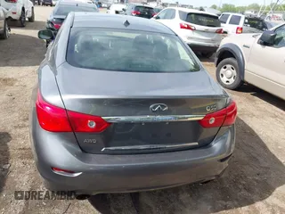 2015 Infiniti Q50 Premium z VIN JN1BV7AR1FM398047, wystawiony jako IAAI lot #42203862 z przebiegiem 104 002 mil mil oraz . Historia ofert i sprzedaży dostępna na DreamBid. Obrazek 16.