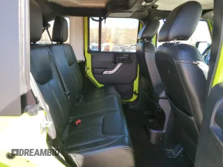 2016 Jeep Wrangler Unlimited Rubicon with VIN 1C4HJWFG2GL296235, listed as a Copart auction lot 50576595 with 60,076 mi miles and Salvage Title. Bid and sale history available at carsss.com. Image 11.