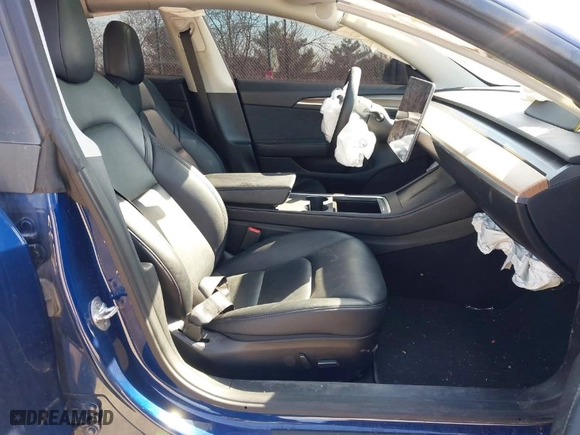 2022 Tesla Model 3 Long Range with VIN 5YJ3E1EB0NF191717, listed as a IAAI auction lot 41722202 with 67,811 mi miles. Bid and sale history available at carsss.com. Image 5.