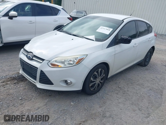 2012 Ford Focus SE z VIN 1FAHP3K27CL270382, wystawiony jako IAAI lot #42317068 z przebiegiem 152 591 mil mil oraz . Historia ofert i sprzedaży dostępna na DreamBid. Obrazek 2.