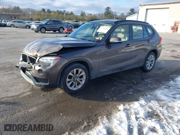 2014 BMW X1 xDrive28i with VIN WBAVL1C56EVY19340, listed as a IAAI auction lot 41340436 with 85,867 mi miles. Bid and sale history available at carsss.com. Image 17.