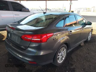 2016 Ford Focus SE with VIN 1FADP3F28GL330815, listed as a IAAI auction lot 41696821 with 125,247 mi miles. Bid and sale history available at carsss.com. Image 4.