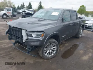 2022 Ram 1500 Laramie with VIN 1C6SRFJT3NN400159, listed as a IAAI auction lot 42167812 with 16,790 mi miles and . Bid and sale history available at DreamBid. Image 2.