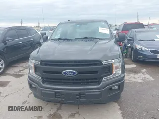 2018 Ford F-150 XL with VIN 1FTMF1C53JKE85608, listed as a IAAI auction lot 41823771 with 142,151 mi miles. Bid and sale history available at carsss.com. Image 6.