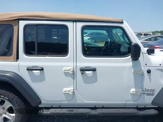 2019 Jeep Wrangler Unlimited Sport S with VIN 1C4HJXDN2KW508341, listed as a IAAI auction lot 42286619 with 49,410 mi miles and . Bid and sale history available at DreamBid. Image 13.