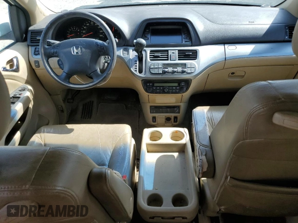 2010 Honda Odyssey EX-L with VIN 5FNRL3H77AB051869, listed as a Copart auction lot 48473815 with 248,511 mi miles and Salvage Title. Bid and sale history available at DreamBid. Image 8.