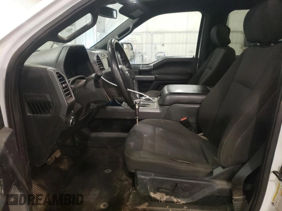 2020 Ford F-150 XL with VIN 1FTFW1E49LFC33659, listed as a Copart auction lot 52859575 with 104,623 mi miles and Salvage Title. Bid and sale history available at carsss.com. Image 7.