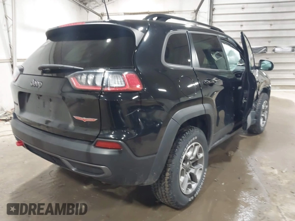 2022 Jeep Cherokee Trailhawk with VIN 1C4PJMBX8ND517236, listed as a IAAI auction lot 41530369 with 34,164 mi miles and . Bid and sale history available at DreamBid. Image 4.