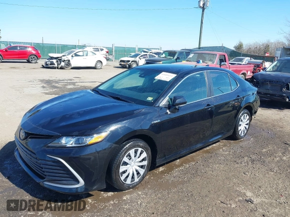 2021 Toyota Camry Hybrid LE with VIN 4T1C31AK4MU553612, listed as a IAAI auction lot 41609111 with 34,399 mi miles. Bid and sale history available at carsss.com. Image 2.