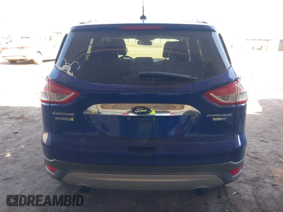 2016 Ford Escape Titanium with VIN 1FMCU9JXXGUB58961, listed as a IAAI auction lot 41772977 with 122,665 mi miles. Bid and sale history available at carsss.com. Image 16.
