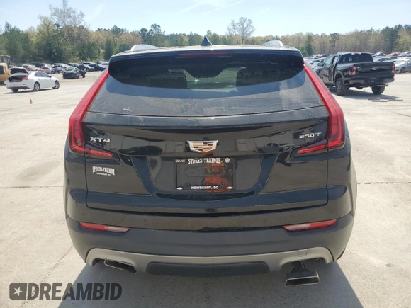 2021 Cadillac XT4 FWD Premium Luxury z VIN 1GYFZCR48MF002468, wystawiony jako Copart lot #50878955 z przebiegiem 76 034 mil mil oraz Szkoda całkowita • Salvage title. Historia ofert i sprzedaży dostępna na DreamBid. Obrazek 6.