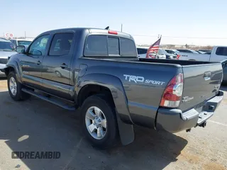 2014 Toyota Tacoma PreRunner with VIN 3TMJU4GN0EM164077, listed as a IAAI auction lot 41712542 with 69,443 mi miles. Bid and sale history available at carsss.com. Image 3.