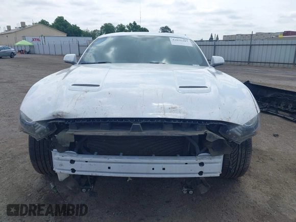 2019 Ford Mustang EcoBoost with VIN 1FA6P8THXK5143703, listed as a IAAI auction lot 42056207 with 71,251 mi miles and . Bid and sale history available at carsss.com. Image 13.
