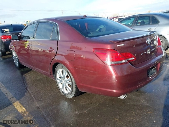 2009 Toyota Avalon XL with VIN 4T1BK36B69U348321, listed as a IAAI auction lot 41478085 with 182,541 mi miles. Bid and sale history available at carsss.com. Image 3.