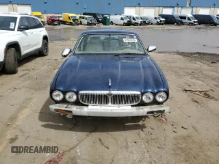 1998 Jaguar XJ Vanden Plas with VIN SAJKX6246WC832202, listed as a Copart auction lot 51665525 with 96,592 mi miles and Clean Title. Bid and sale history available at DreamBid. Image 5.