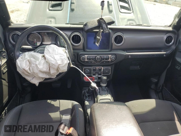 2022 Jeep Wrangler Unlimited Rubicon with VIN 1C4JJXR69NW206276, listed as a Copart auction lot 55247595 with 39,273 mi miles and Salvage title. Bid and sale history available at DreamBid. Image 8.
