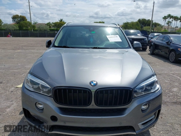 2016 BMW X5 xDrive40e with VIN 5UXKT0C58G0S75938, listed as a IAAI auction lot 42021138 with 97,426 mi miles and . Bid and sale history available at DreamBid. Image 6.