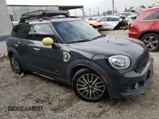 2019 MINI Countryman Cooper S E with VIN WMZYU7C53K3F93901, listed as a Copart auction lot 69345474 with 72,425 mi miles and Salvage Title. Bid and sale history available at carsss.com. Image 4.