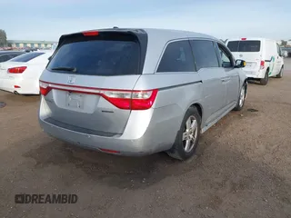 2012 Honda Odyssey Touring with VIN 5FNRL5H96CB095264, listed as a IAAI auction lot 41403450 with 246,199 mi miles and . Bid and sale history available at carsss.com. Image 4.