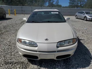 2003 Oldsmobile Aurora z VIN 1G3GS64CX34163493, wystawiony jako Copart lot #75863314 z przebiegiem 211 607 mil mil oraz Szkody całkowita. Historia ofert i sprzedaży dostępna na DreamBid. Obrazek 5.