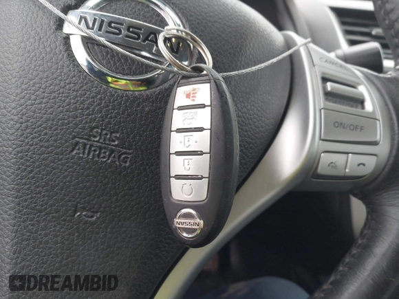 2018 Nissan Altima SR with VIN 1N4AL3AP9JC139011, listed as a IAAI auction lot 42018392 with 163,674 mi miles and . Bid and sale history available at carsss.com. Image 11.