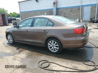2013 Volkswagen Jetta SE with VIN 3VWDP7AJ7DM372884, listed as a Copart auction lot 60687755 with 123,754 mi miles and Salvage title. Bid and sale history available at DreamBid. Image 2.