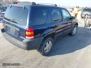 2003 Ford Escape XLT Popular 2 with VIN 1FMYU93103KE17610, listed as a IAAI auction lot 41766806 with 1 mi miles. Bid and sale history available at carsss.com. Image 4.