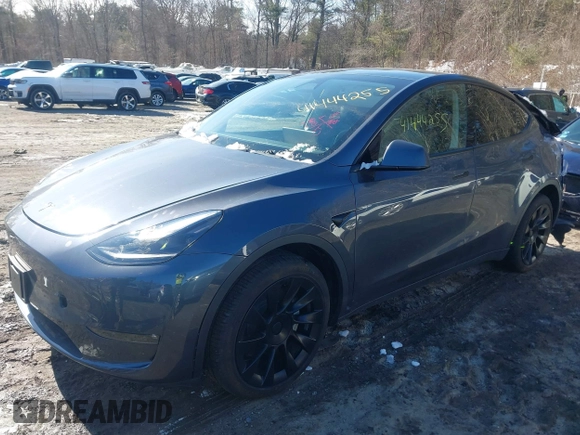 2023 Tesla Model Y Long Range with VIN 7SAYGAEE9PF905943, listed as a IAAI auction lot 41444255 with 11,179 mi miles and . Bid and sale history available at DreamBid. Image 16.