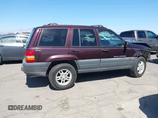 1996 Jeep Grand Cherokee Laredo with VIN 1J4GZ58S3TC391942, listed as a IAAI auction lot 41711778 with 202,765 mi miles. Bid and sale history available at carsss.com. Image 14.