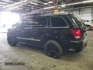 2008 Jeep Grand Cherokee SRT-8 with VIN 1J8HR78378C168740, listed as a Copart auction lot 87053654 with 139,760 mi miles and Salvage Title. Bid and sale history available at carsss.com. Image 2.