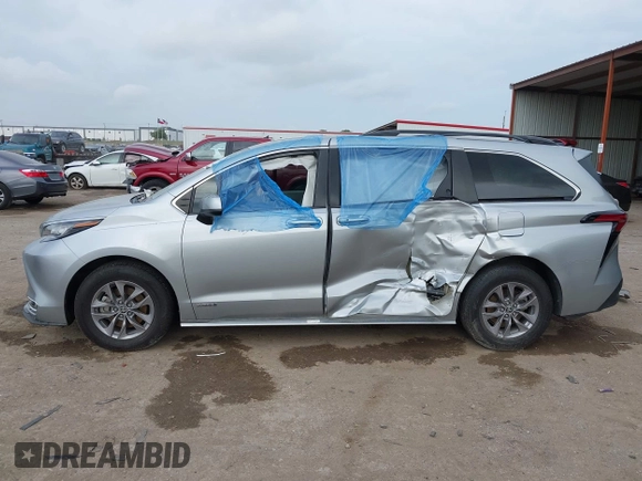 2021 Toyota Sienna XLE with VIN 5TDYRKEC9MS041334, listed as a IAAI auction lot 42145698 with 117,229 mi miles and . Bid and sale history available at DreamBid. Image 14.