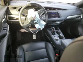 2022 Cadillac XT4 FWD Premium Luxury z VIN 1GYFZCR44NF151123, wystawiony jako Copart lot #50312745 z przebiegiem 46 820 mil mil oraz Szkoda całkowita • Salvage title. Historia ofert i sprzedaży dostępna na DreamBid. Obrazek 8.