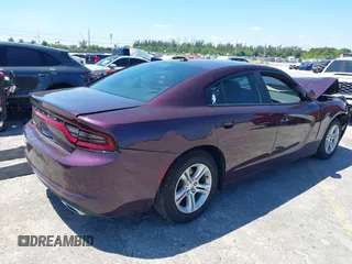 2020 Dodge Charger SXT with VIN 2C3CDXBG5LH220064, listed as a IAAI auction lot 42028723 with 25,140 mi miles and . Bid and sale history available at carsss.com. Image 4.