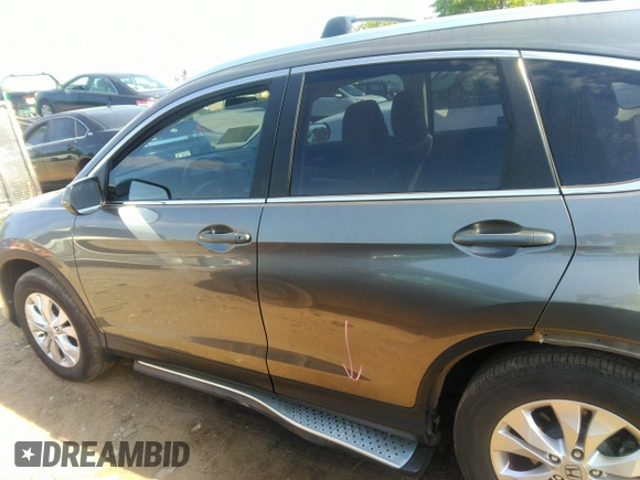 2012 Honda CR-V EX-L with VIN JHLRM4H70CC021165, listed as a IAAI auction lot 42023012 with 147,603 mi miles and . Bid and sale history available at DreamBid. Image 14.