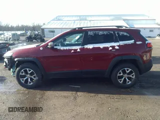 2014 Jeep Cherokee Trailhawk with VIN 1C4PJMBS9EW161047, listed as a IAAI auction lot 41841038 with Not Provided miles. Bid and sale history available at carsss.com. Image 14.