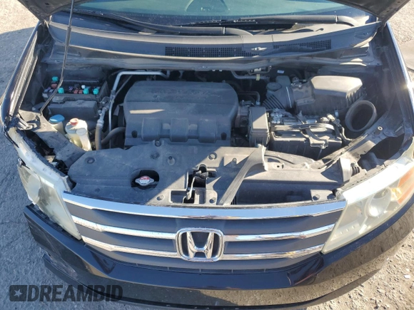 2012 Honda Odyssey EX-L with VIN 5FNRL5H64CB052869, listed as a Copart auction lot 47685375 with 168,449 mi miles and Salvage Title. Bid and sale history available at DreamBid. Image 12.