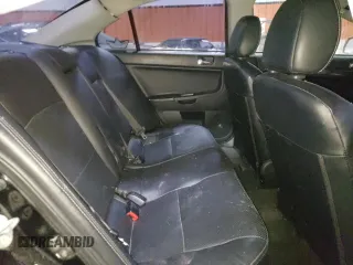 2009 Mitsubishi Lancer GTS z VIN JA3AU86W99U602354, wystawiony jako Copart lot #58919705 z przebiegiem 232 045 mil mil oraz Szkoda całkowita • Salvage title. Historia ofert i sprzedaży dostępna na DreamBid. Obrazek 10.
