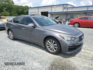 2014 Infiniti Q50 Sport with VIN JN1BV7AR4EM702521, listed as a Copart auction lot 61017205 with 61,317 mi miles and Salvage title. Bid and sale history available at DreamBid. Image 4.