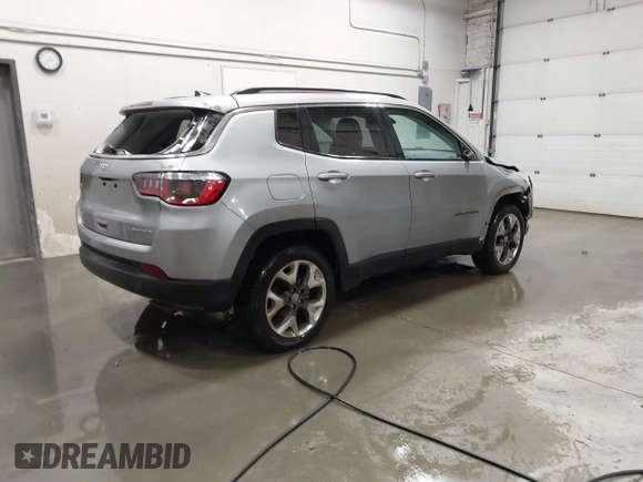 2020 Jeep Compass Limited with VIN 3C4NJDCB6LT148085, listed as a IAAI auction lot 41537903 with 55,878 mi miles and . Bid and sale history available at carsss.com. Image 4.