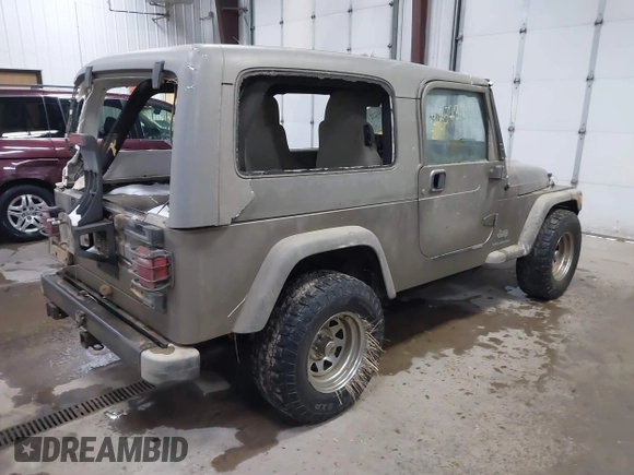 2006 Jeep Wrangler Unlimited LWB with VIN 1J4FA44S96P714309, listed as a IAAI auction lot 41252391 with 164,720 mi miles. Bid and sale history available at carsss.com. Image 4.