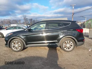2017 Hyundai Santa Fe 2.0T with VIN 5XYZUDLA8HG502333, listed as a IAAI auction lot 41246195 with 62,772 mi miles and . Bid and sale history available at DreamBid. Image 14.