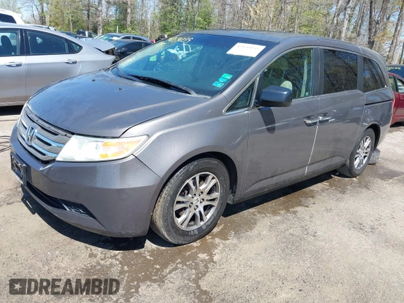 2012 Honda Odyssey EX-L with VIN 5FNRL5H68CB006686, listed as a IAAI auction lot 42039035 with 338,331 mi miles and . Bid and sale history available at carsss.com. Image 2.