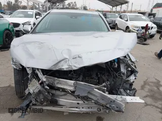 2019 Toyota Camry LE z VIN 4T1B11HK7KU713082, wystawiony jako IAAI lot #42151362 z przebiegiem 93 546 mil mil oraz . Historia ofert i sprzedaży dostępna na DreamBid. Obrazek 13.