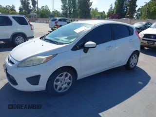 2013 Ford Fiesta S с VIN 3FADP4TJ3DM215650, выставлен на аукционе IAAI как лот 42462870 с пробегом 142 762 миль миль и . История ставок и продаж доступна на DreamBid. Изображение 2.
