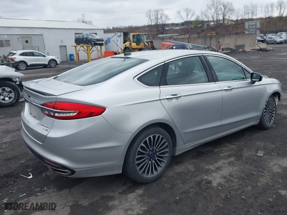 2018 Ford Fusion Titanium with VIN 3FA6P0D99JR139114, listed as a IAAI auction lot 41991248 with 142,324 mi miles. Bid and sale history available at carsss.com. Image 4.