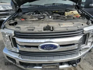 2019 Ford F-250 XL with VIN 1FT7W2BT9KEC24552, listed as a Copart auction lot 60644435 with 115,689 mi miles and Salvage title. Bid and sale history available at DreamBid. Image 11.