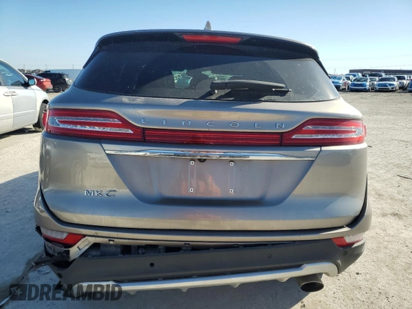 2019 Lincoln MKC Select with VIN 5LMCJ2D96KUL02511, listed as a Copart auction lot 48630875 with 83,635 mi miles and Salvage title. Bid and sale history available at DreamBid. Image 6.