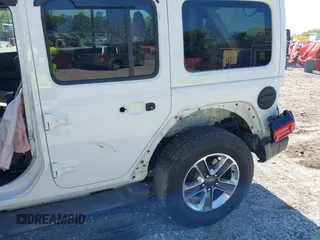 2019 Jeep Wrangler Unlimited Sahara with VIN 1C4HJXEN5KW509806, listed as a IAAI auction lot 42071325 with 95,549 mi miles and . Bid and sale history available at DreamBid. Image 20.
